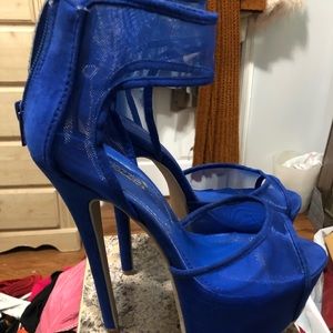 Royal blue mesh 6 inch peep toe heels.